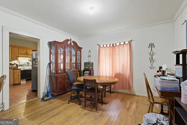 a view of a livingroom with furniture and window