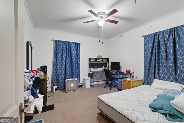 a view of a workspace with furniture