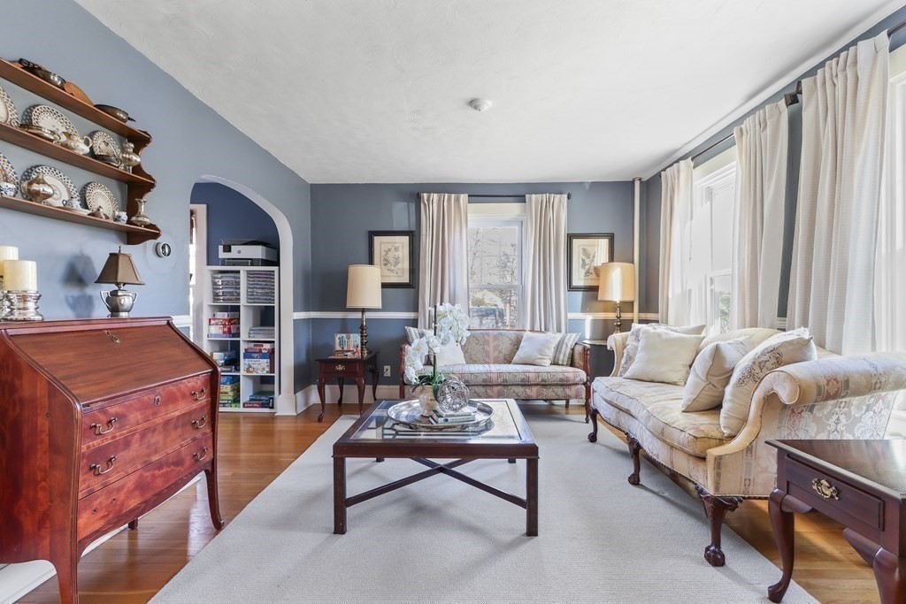 79 Kendall Lane Natick, MA 01760 - Photo 15 of 32 a living room with furniture and a large window
