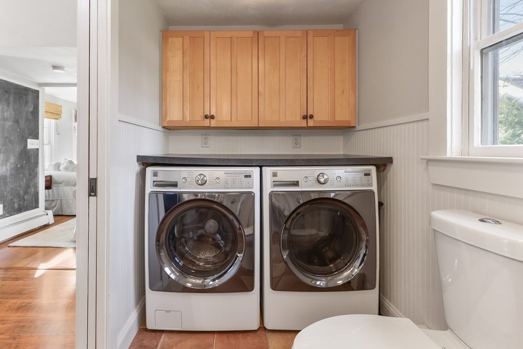 79 Kendall Lane Natick, MA 01760 - Photo 19 of 32 a utility room with dryer and washer
