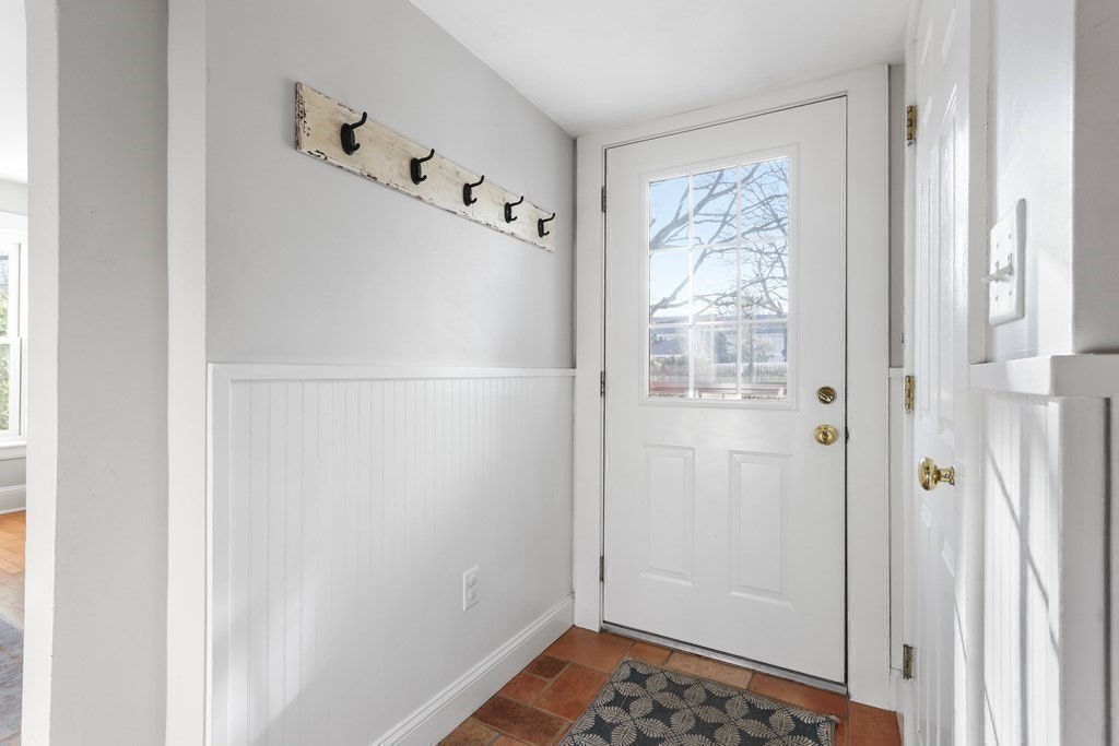 79 Kendall Lane Natick, MA 01760 - Photo 20 of 32 a bathroom with a window and a shower