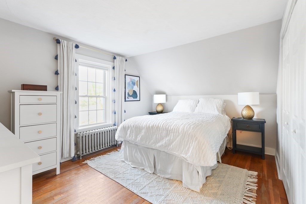 79 Kendall Lane Natick, MA 01760 - Photo 21 of 32 a bedroom with a bed and a window