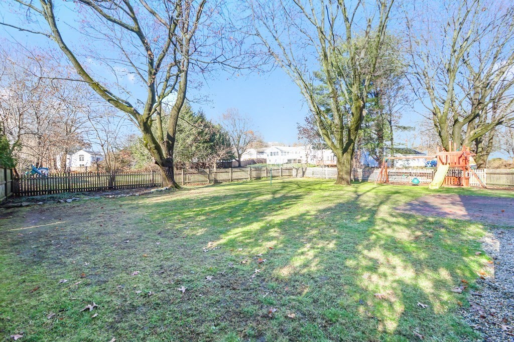 79 Kendall Lane Natick, MA 01760 - Photo 30 of 32 a view of yard with trees