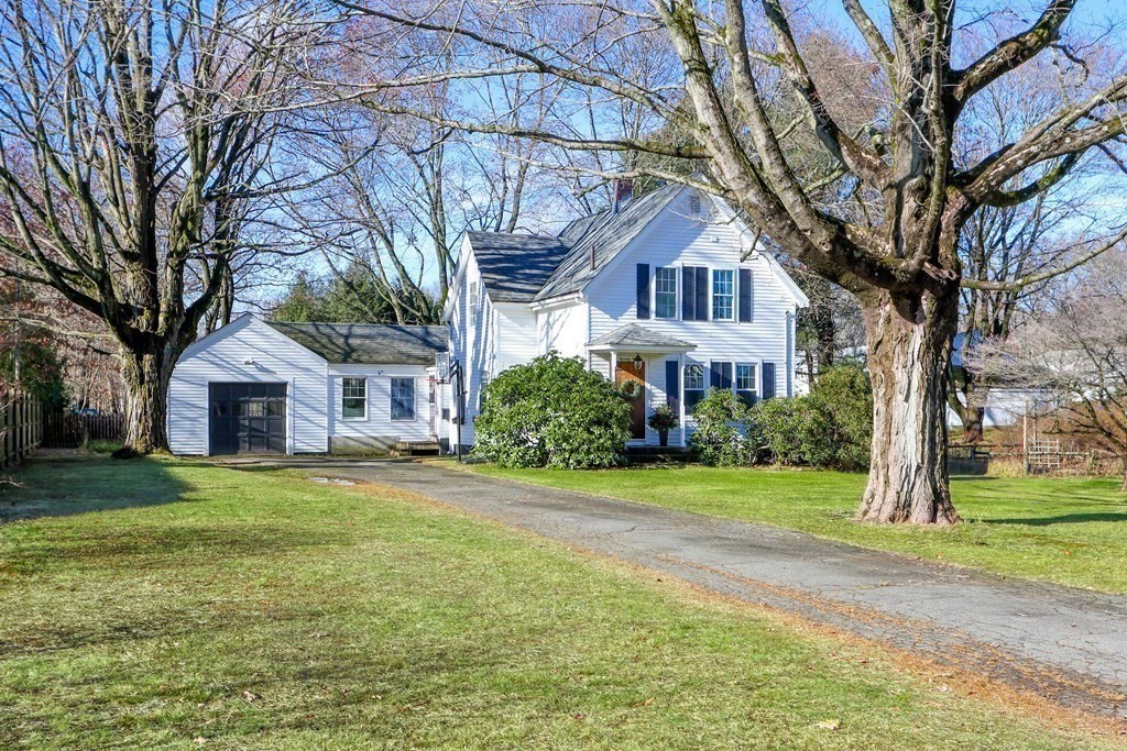 79 Kendall Lane Natick, MA 01760 - Photo 3 of 32 a front view of a house with a yard