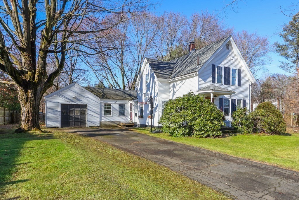 79 Kendall Lane Natick, MA 01760 - Photo 4 of 32 a front view of a house with garden