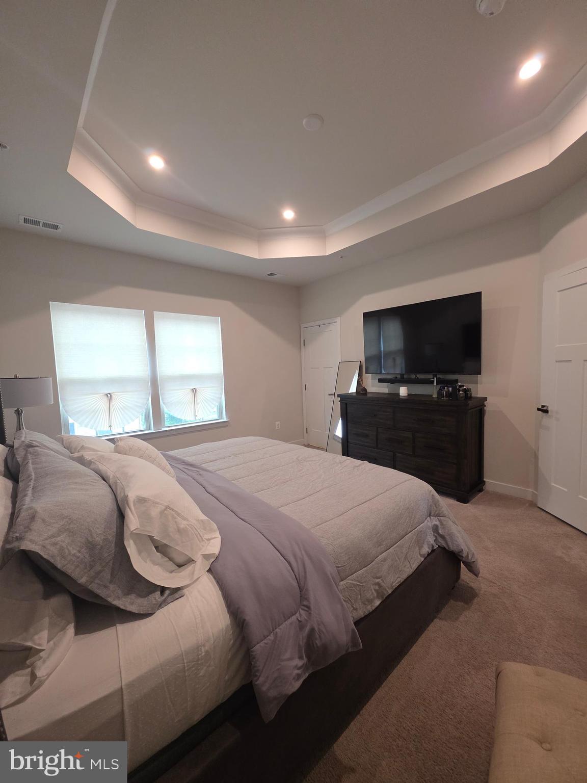 14510 Hunts Farm Road Brandywine, MD 20613 - Photo 39 of 74 a bedroom with a bed and a flat screen tv