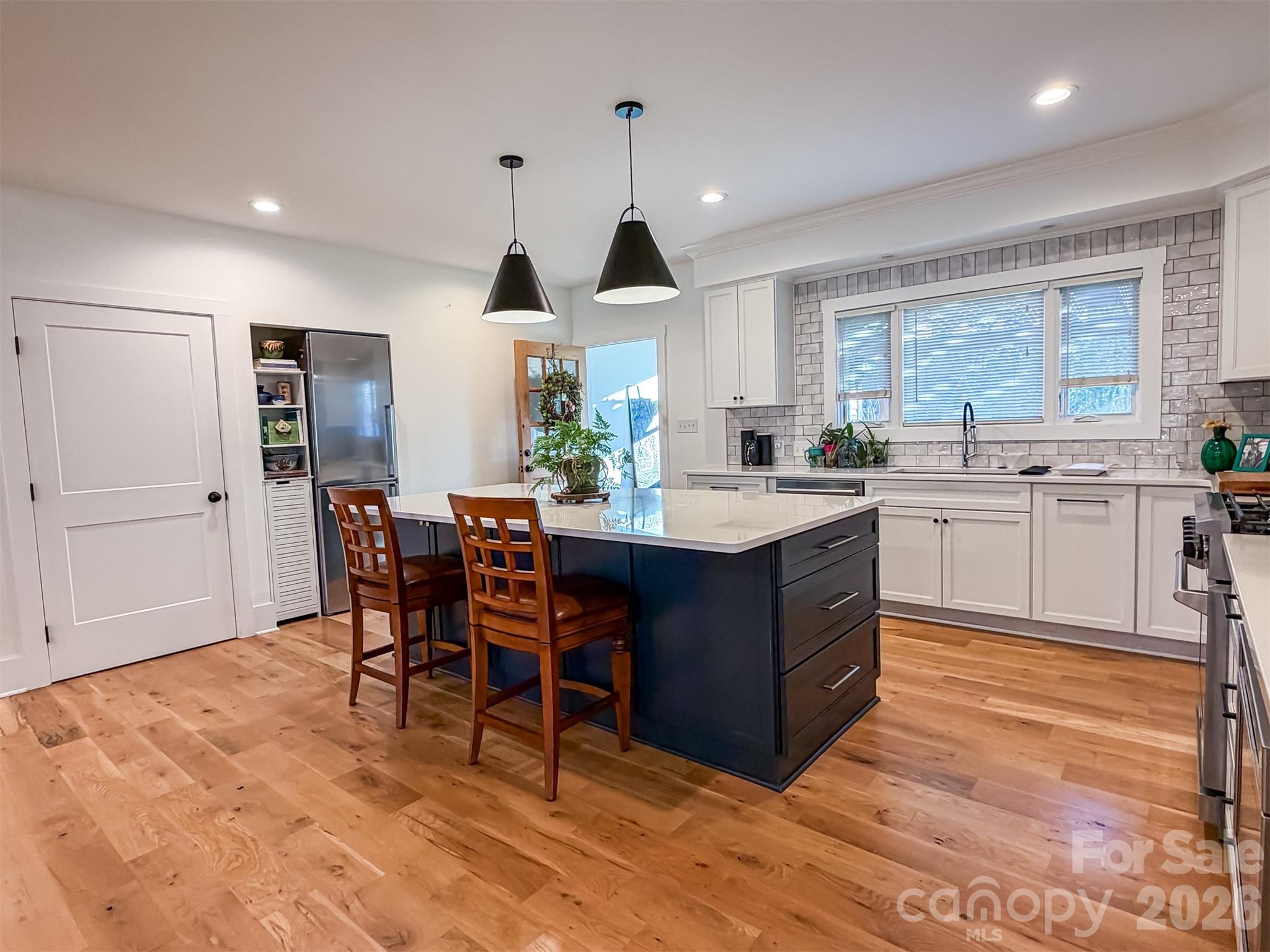 85 20th Avenue Northwest Hickory, NC 28601 - Photo 18 of 47 a kitchen with a sink stove and cabinets