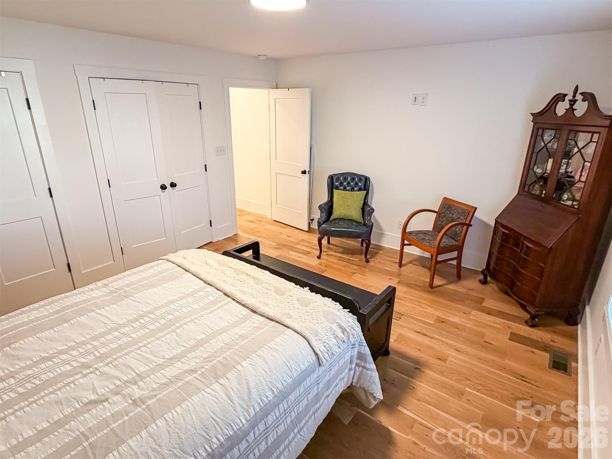 85 20th Avenue Northwest Hickory, NC 28601 - Photo 22 of 47 a bedroom with a bed a chair and dresser