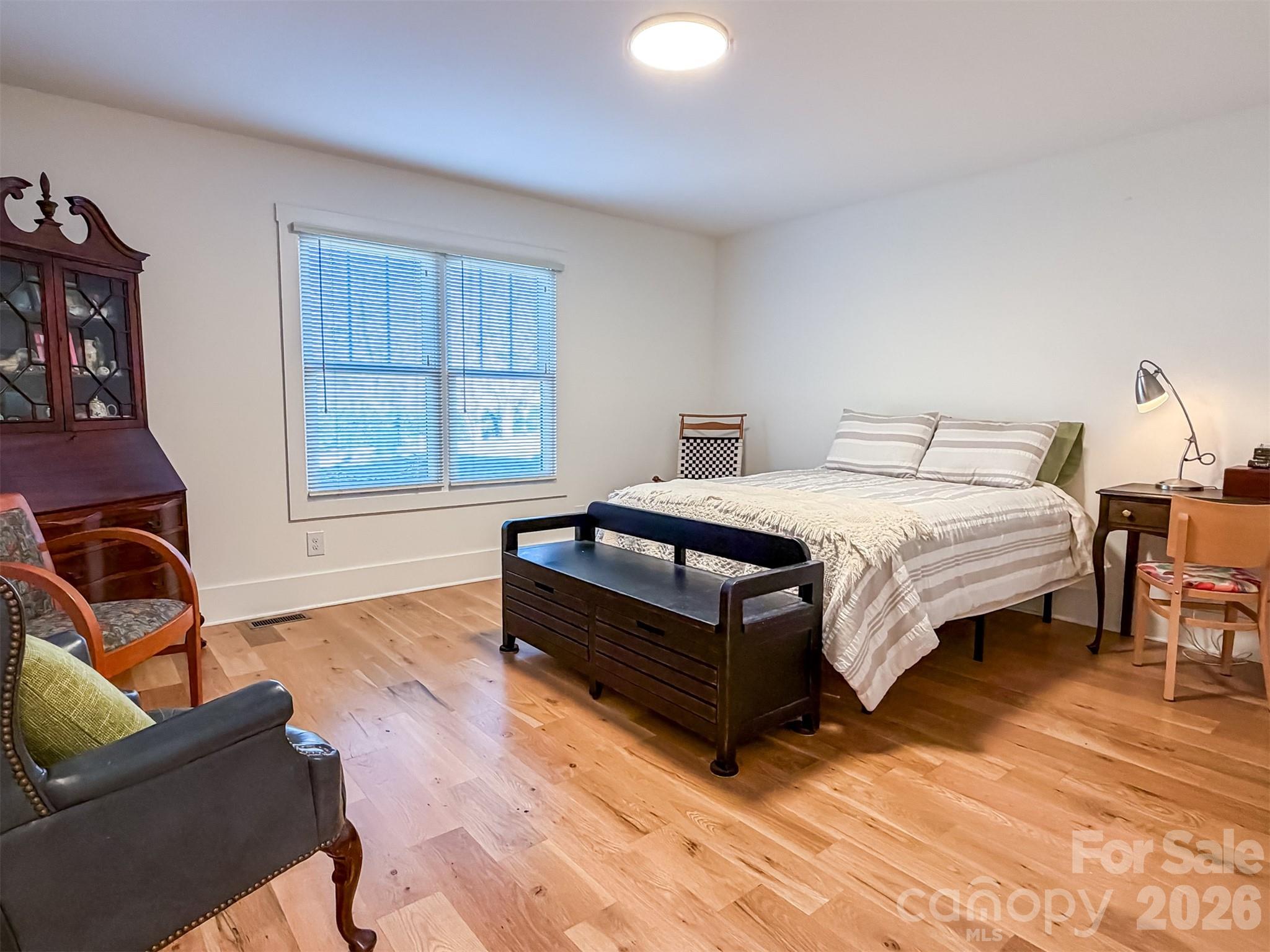 85 20th Avenue Northwest Hickory, NC 28601 - Photo 23 of 47 a bedroom with a bed chair and window