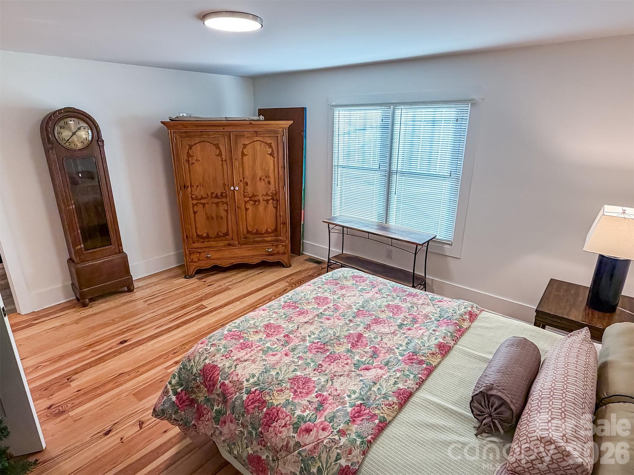 85 20th Avenue Northwest Hickory, NC 28601 - Photo 27 of 47 a bedroom with a bed and wooden floor