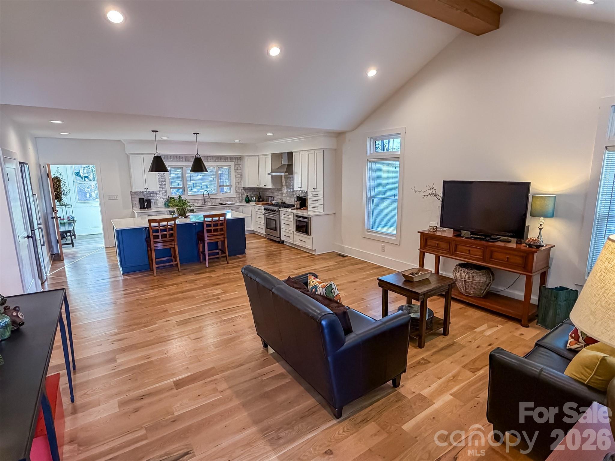 85 20th Avenue Northwest Hickory, NC 28601 - Photo 4 of 47 a living room with furniture flat screen tv and wooden floor