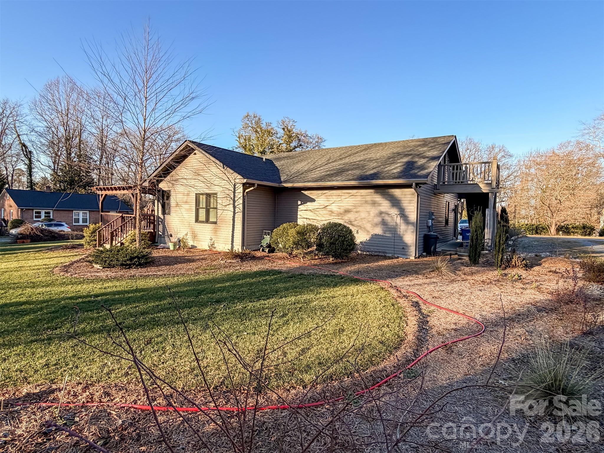 85 20th Avenue Northwest Hickory, NC 28601 - Photo 41 of 47 a view of a house with a yard patio and fire pit