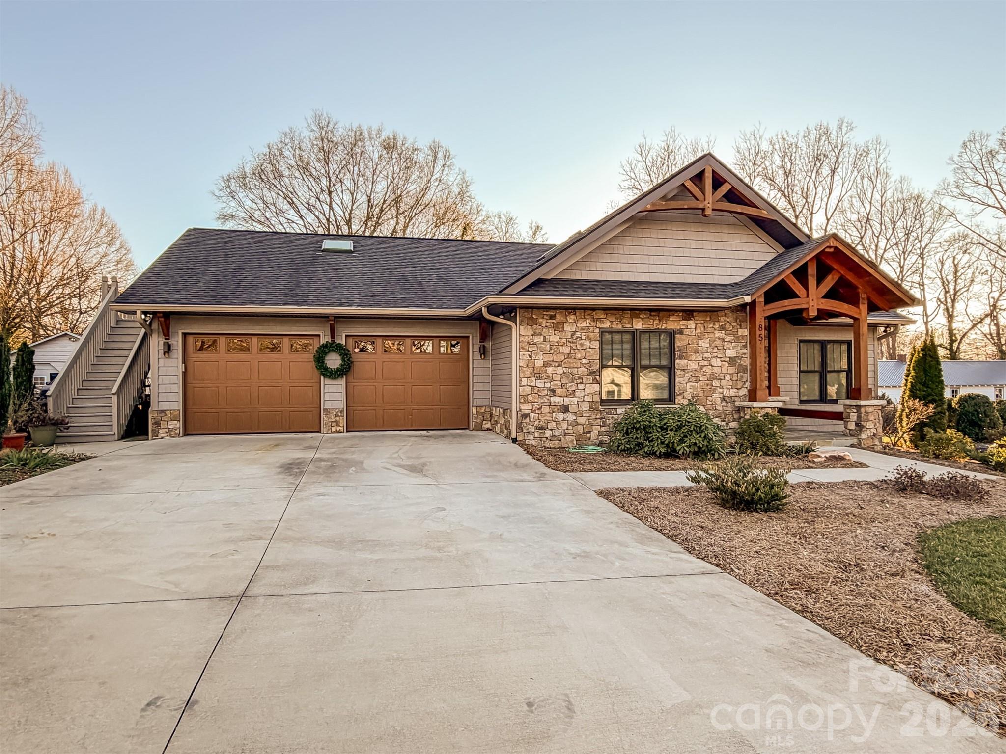 85 20th Avenue Northwest Hickory, NC 28601 - Photo 47 of 47 front view of a house with a yard and potted plants
