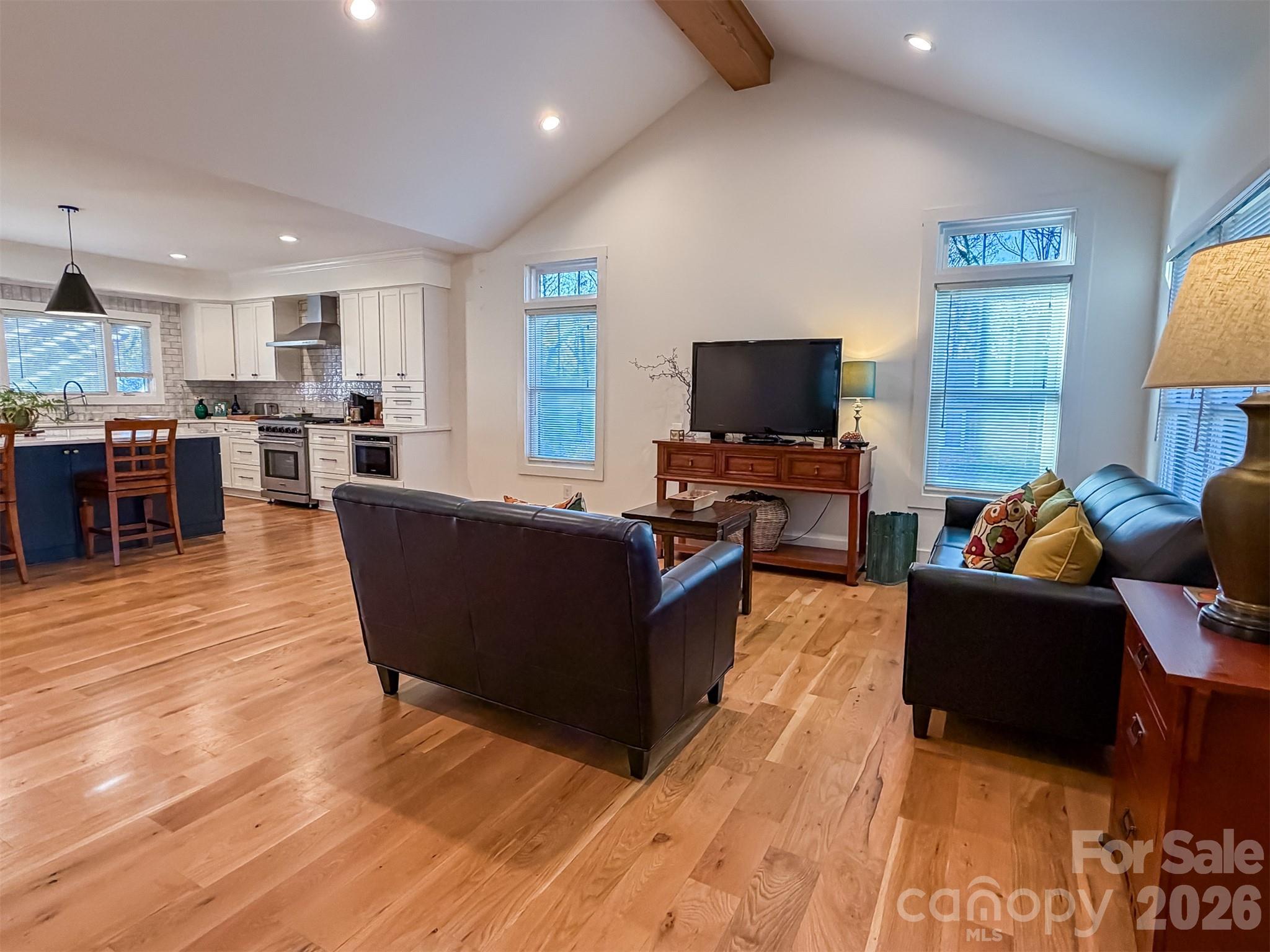 85 20th Avenue Northwest Hickory, NC 28601 - Photo 6 of 47 a living room with furniture and a flat screen tv