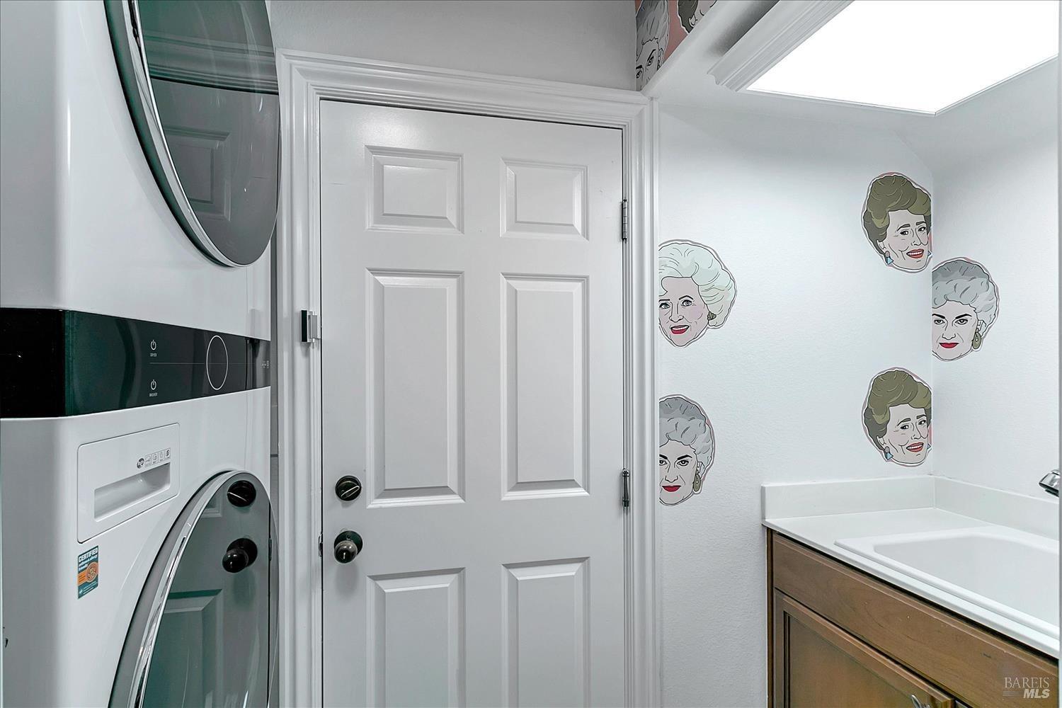 4180 Summer Gate Avenue Vallejo, CA 94591 - Photo 19 of 52 a bathroom with a granite countertop sink a clock and a mirror