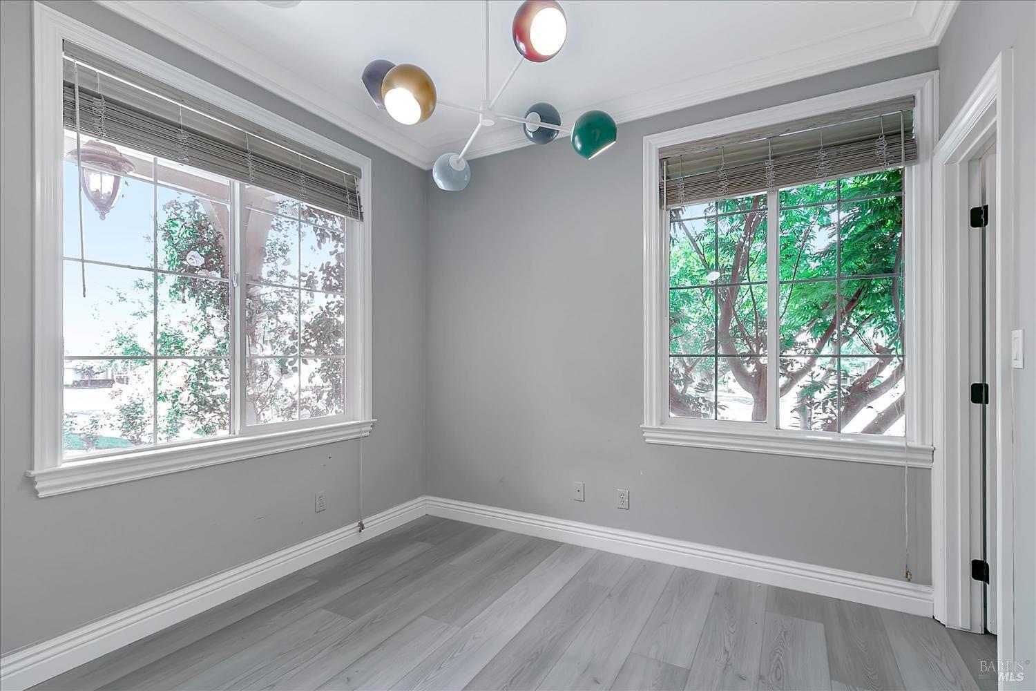 4180 Summer Gate Avenue Vallejo, CA 94591 - Photo 37 of 52 a view of an empty room with wooden floor and a window