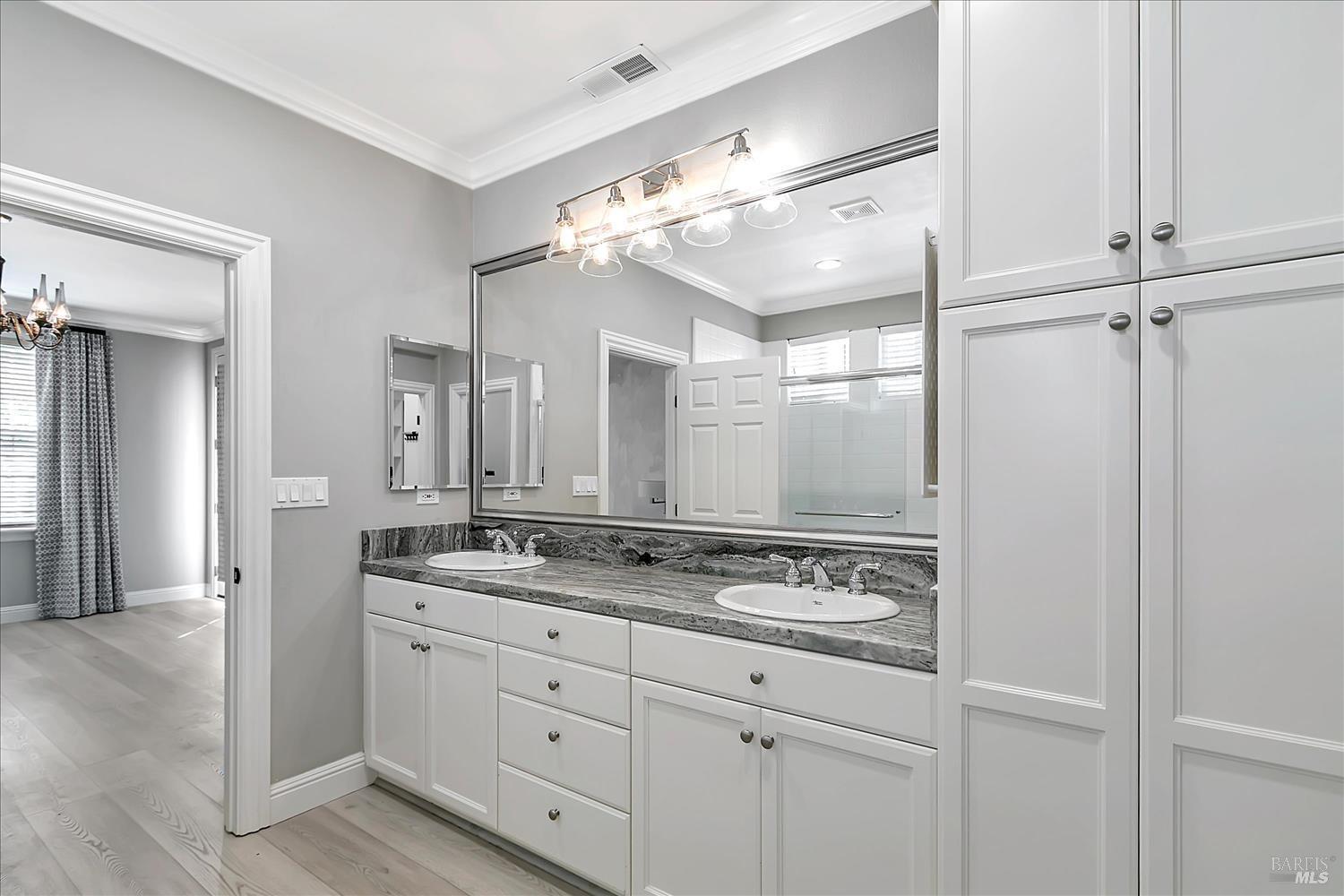 4180 Summer Gate Avenue Vallejo, CA 94591 - Photo 39 of 52 a bathroom with a sink double vanity and a mirror