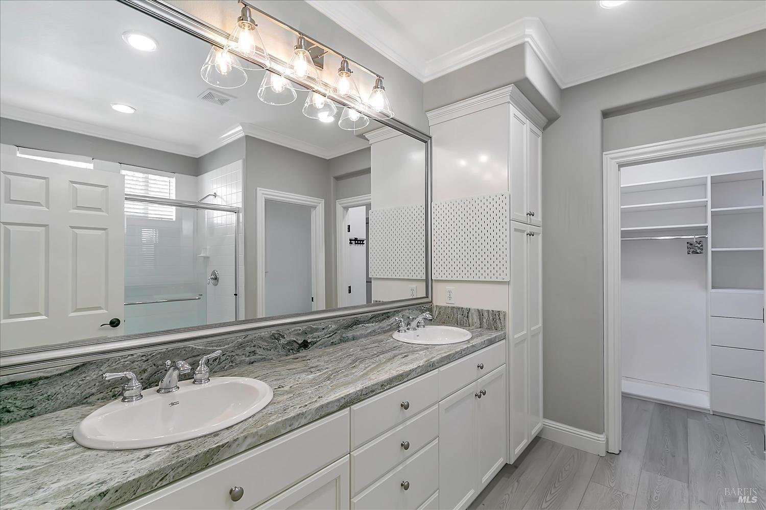 4180 Summer Gate Avenue Vallejo, CA 94591 - Photo 41 of 52 a bathroom with a granite countertop sink double and mirror