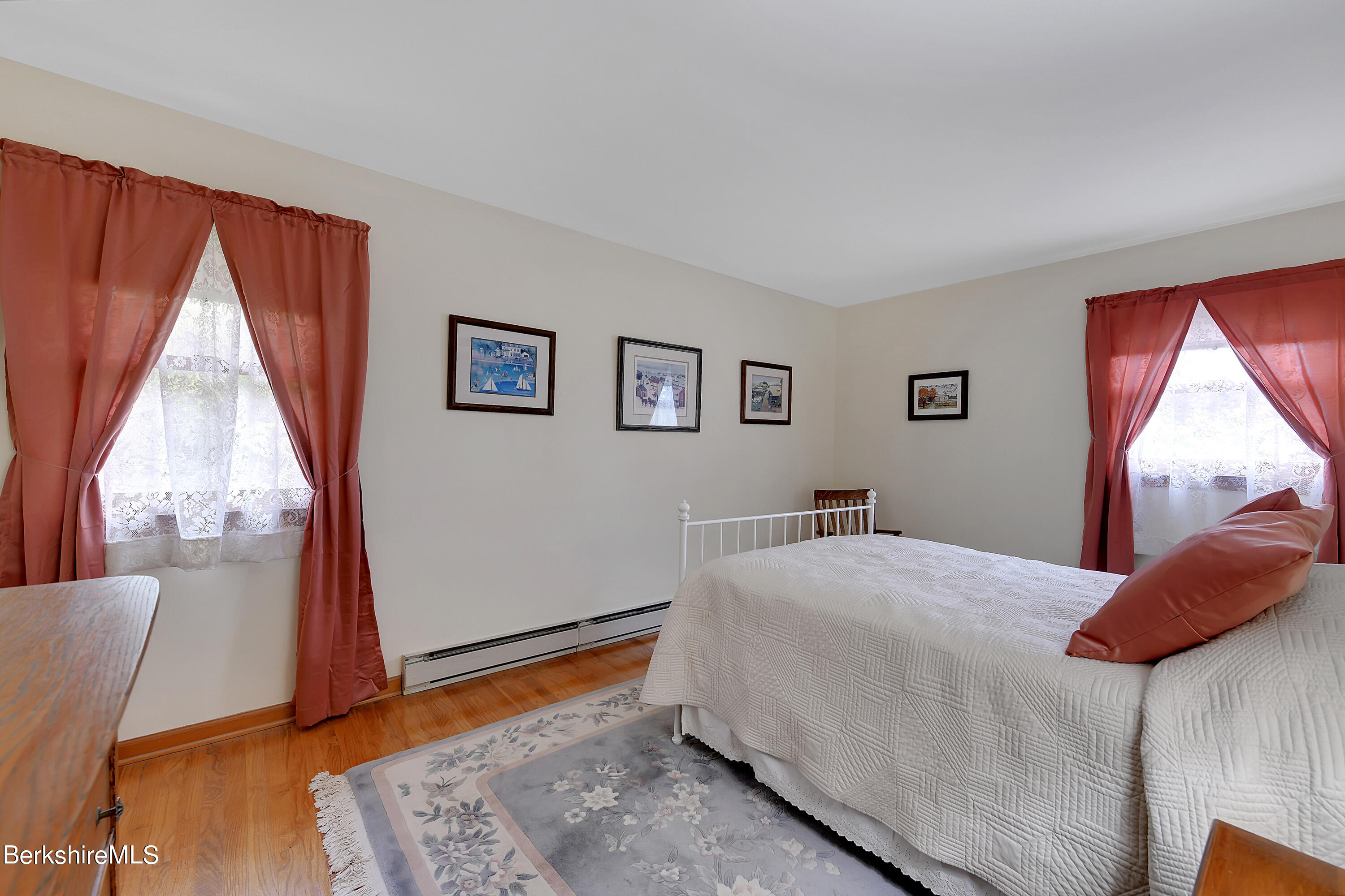 311 Yokun Road Richmond, MA 01201 - Photo 22 of 38 a bedroom with a bed and a window