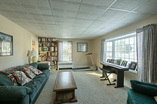 458 Johnson Street North Andover, MA 01845 - Photo 11 of 25 a living room with furniture and a window