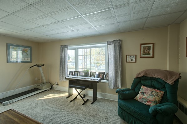 458 Johnson Street North Andover, MA 01845 - Photo 12 of 25 a living room with furniture and a window
