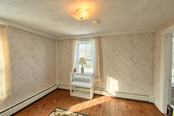 458 Johnson Street North Andover, MA 01845 - Photo 15 of 25 wooden floor in an empty room with a window