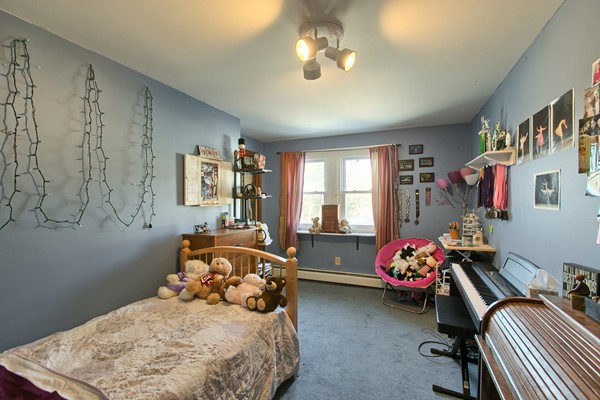 458 Johnson Street North Andover, MA 01845 - Photo 17 of 25 a bedroom with furniture toys and a window