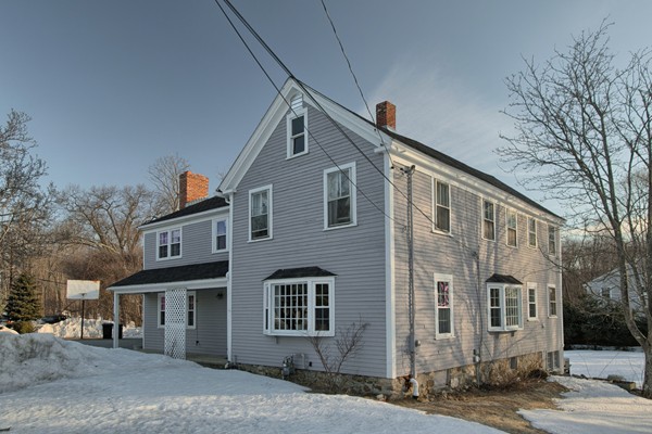 458 Johnson Street North Andover, MA 01845 - Photo 7 of 25 a front view of a house with a yard