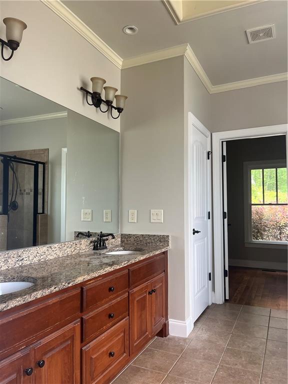 348 Hidden Trail Pendergrass, GA 30567 - Photo 29 of 40 a bathroom with a granite countertop sink and a mirror