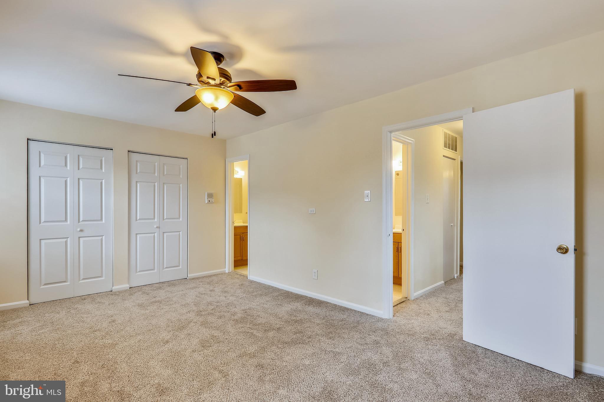 10600 Georgia Avenue Silver Spring, MD 20902 - Photo 16 of 44 Upper level primary bedroom