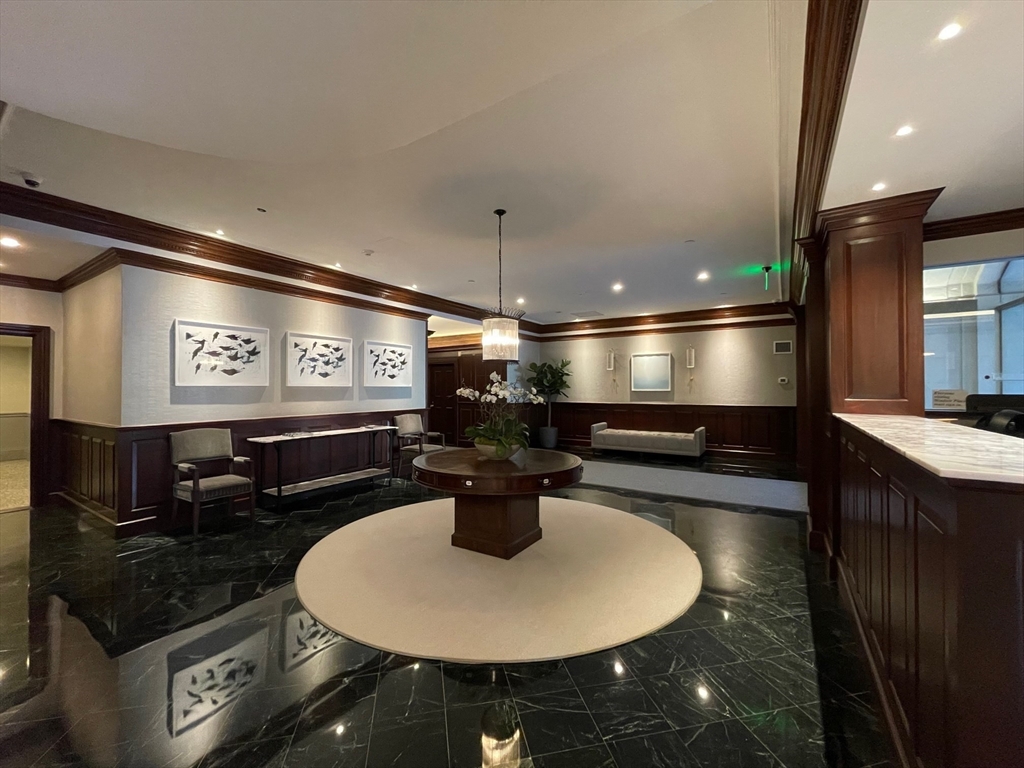 390 Commonwealth Avenue, Unit 210 Boston, MA 02215 - Photo 17 of 19 a kitchen with counter top space and living room