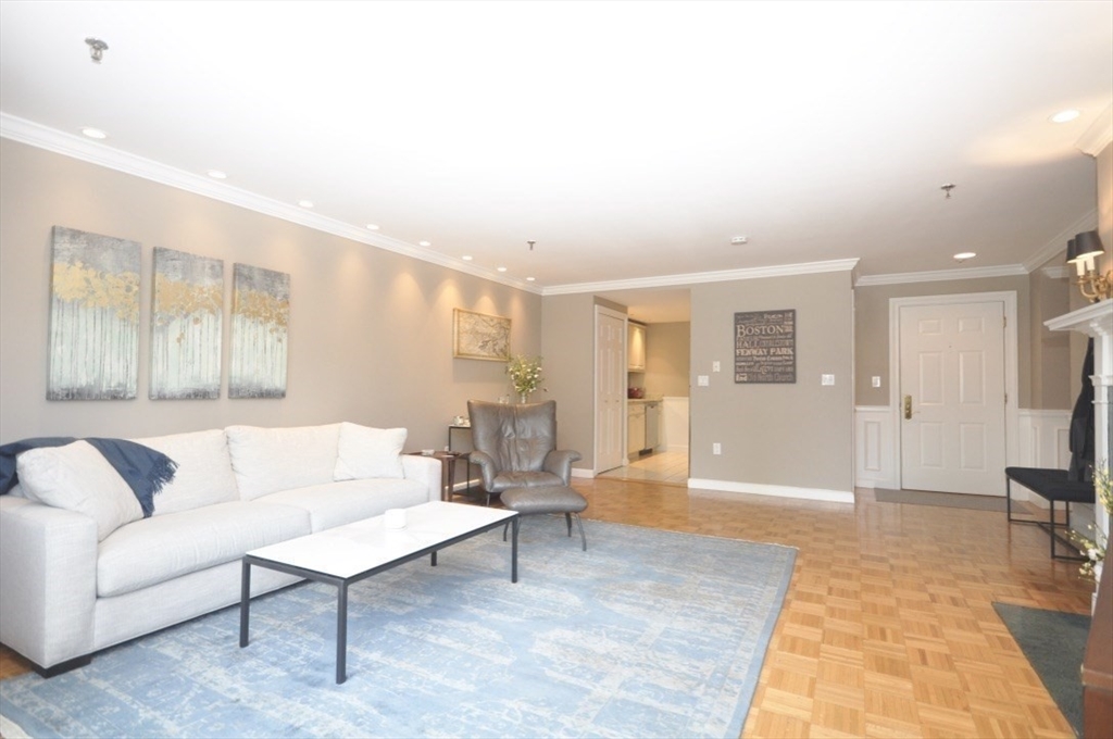 390 Commonwealth Avenue, Unit 210 Boston, MA 02215 - Photo 6 of 19 a living room with furniture and a couch