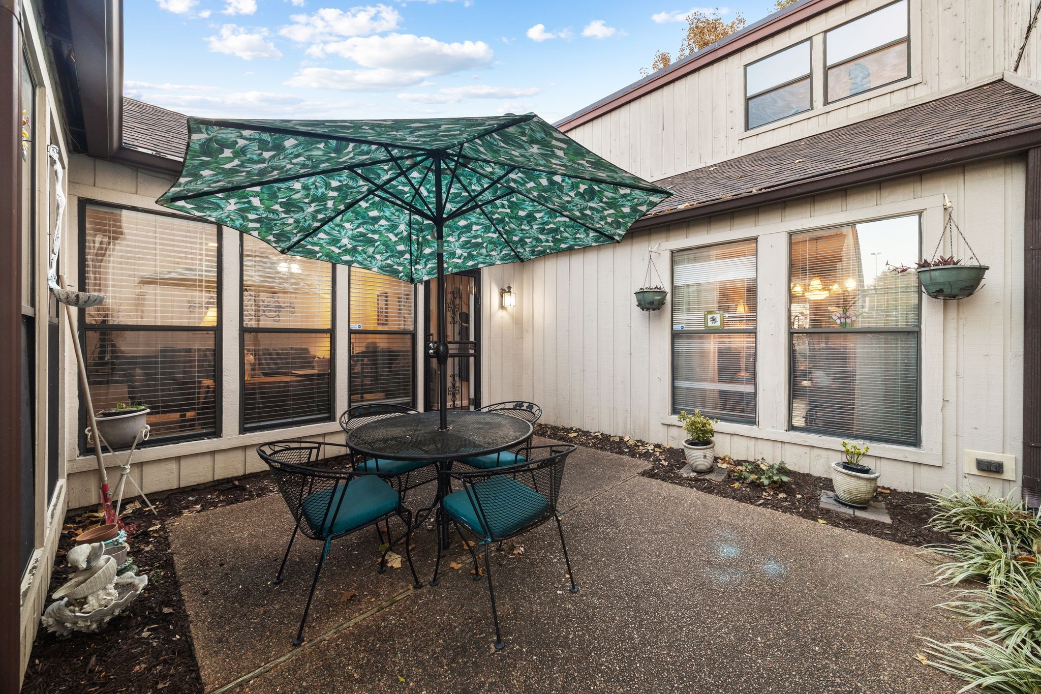 230 Harpers Mill Road Hermitage, TN 37076 - Photo 16 of 17 a patio with table and chairs