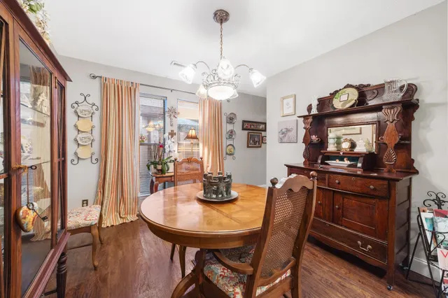 a kitchen with stainless steel appliances a stove a sink and cabinets