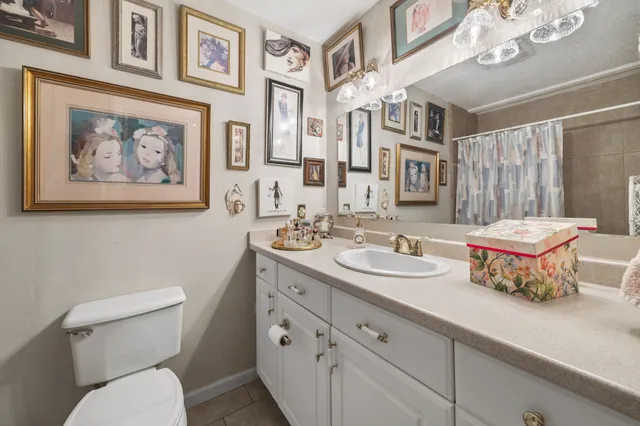 a room with furniture and flat screen tv