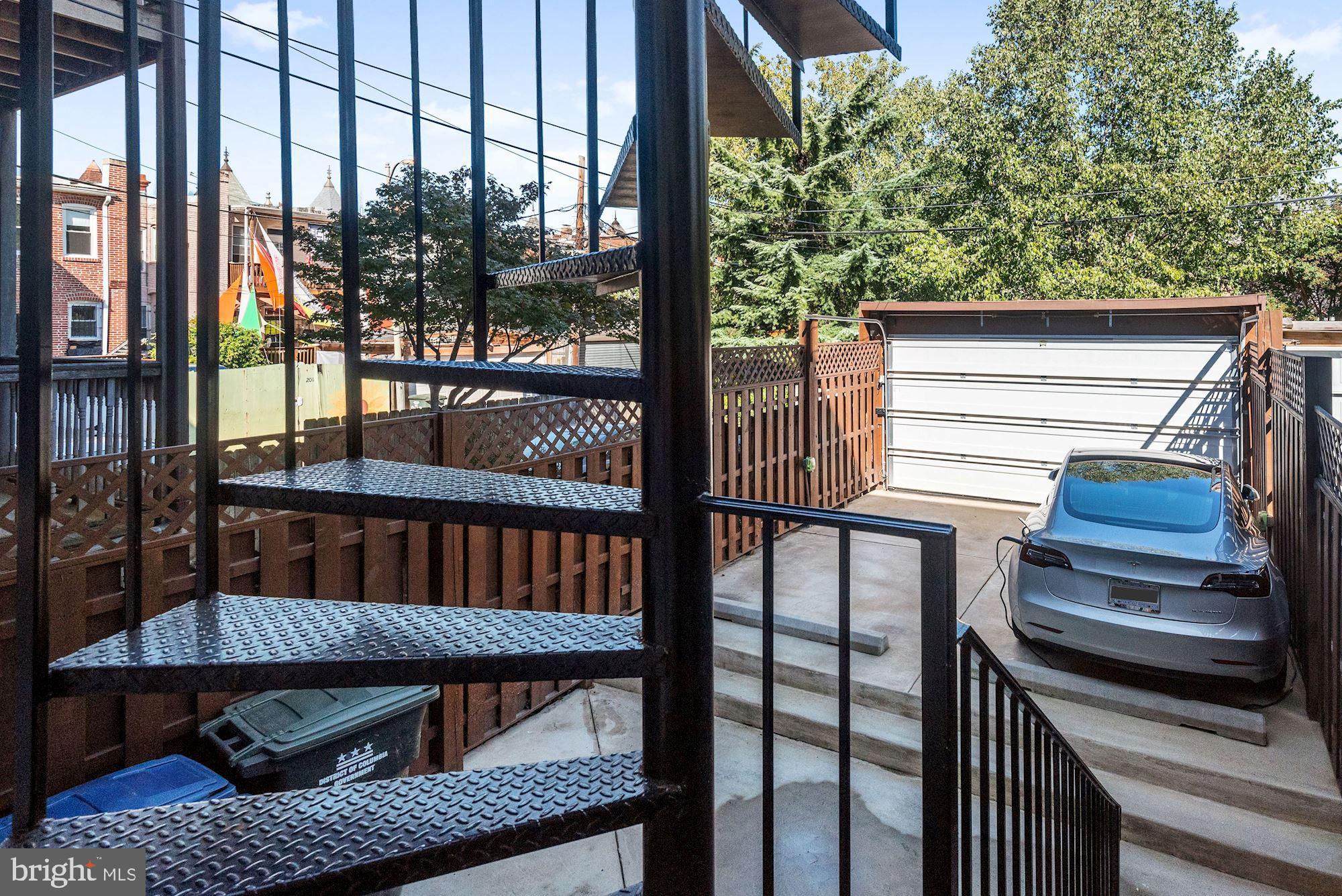 73 U Street Northwest, Unit 1 Washington, DC 20001 - Photo 24 of 30 a view of a chairs and tables in the balcony