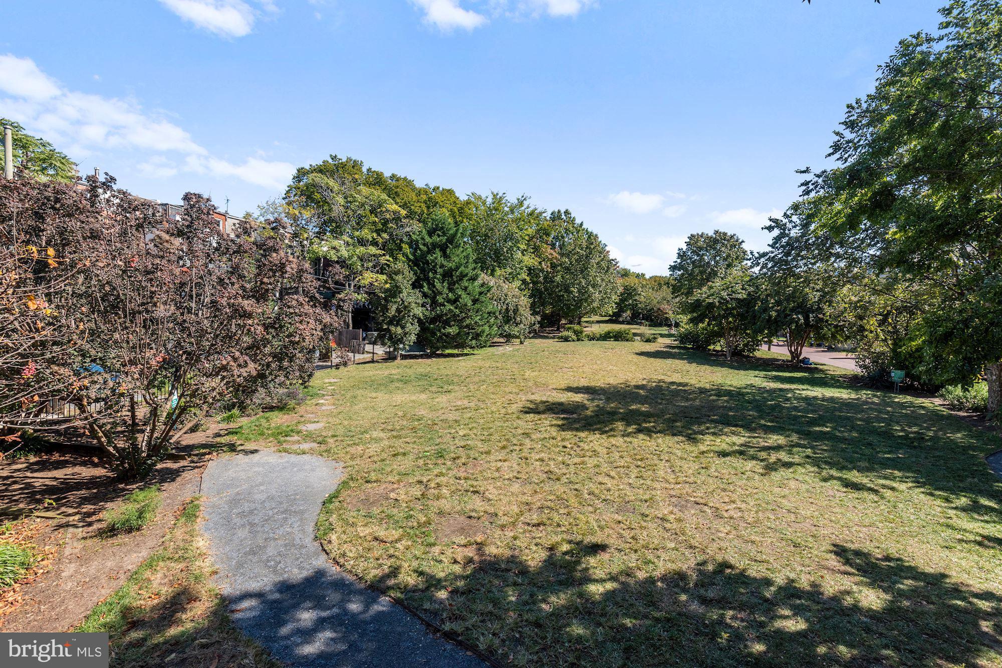 73 U Street Northwest, Unit 1 Washington, DC 20001 - Photo 27 of 30 a view of a yard with trees