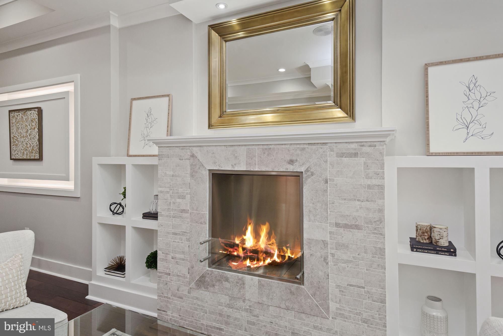73 U Street Northwest, Unit 1 Washington, DC 20001 - Photo 4 of 30 a living room with furniture and a fireplace