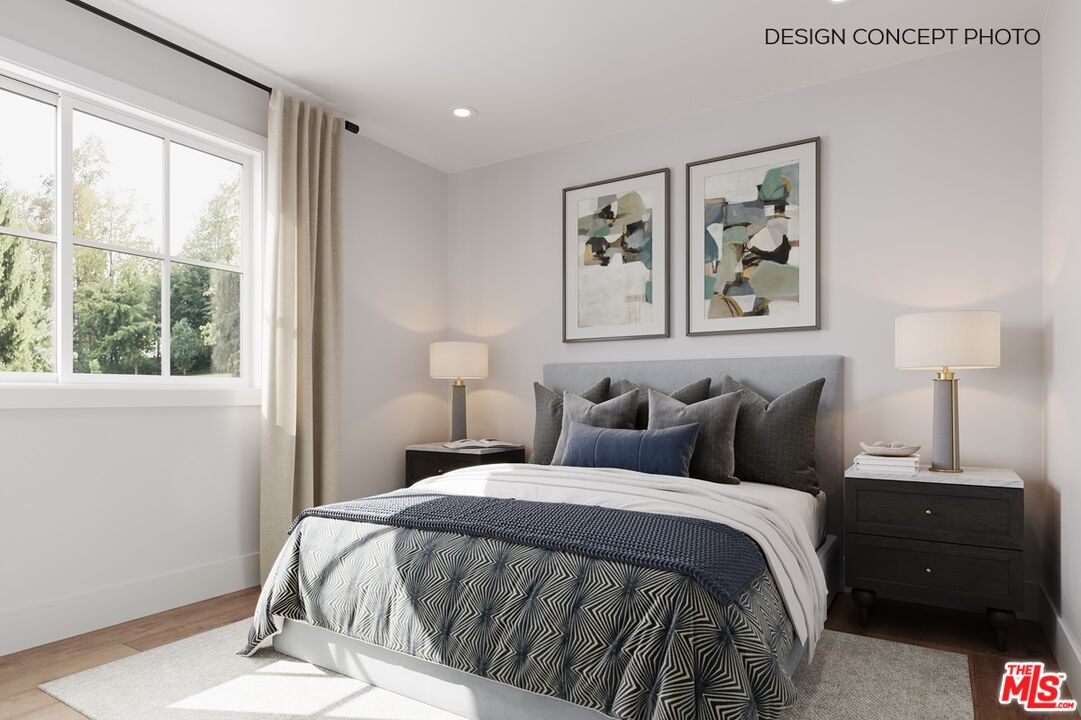 2803 Cardiff Avenue Los Angeles, CA 90034 - Photo 4 of 10 a bedroom with a bed and a window