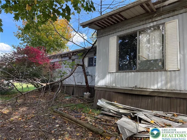 a backyard of a house with seating space
