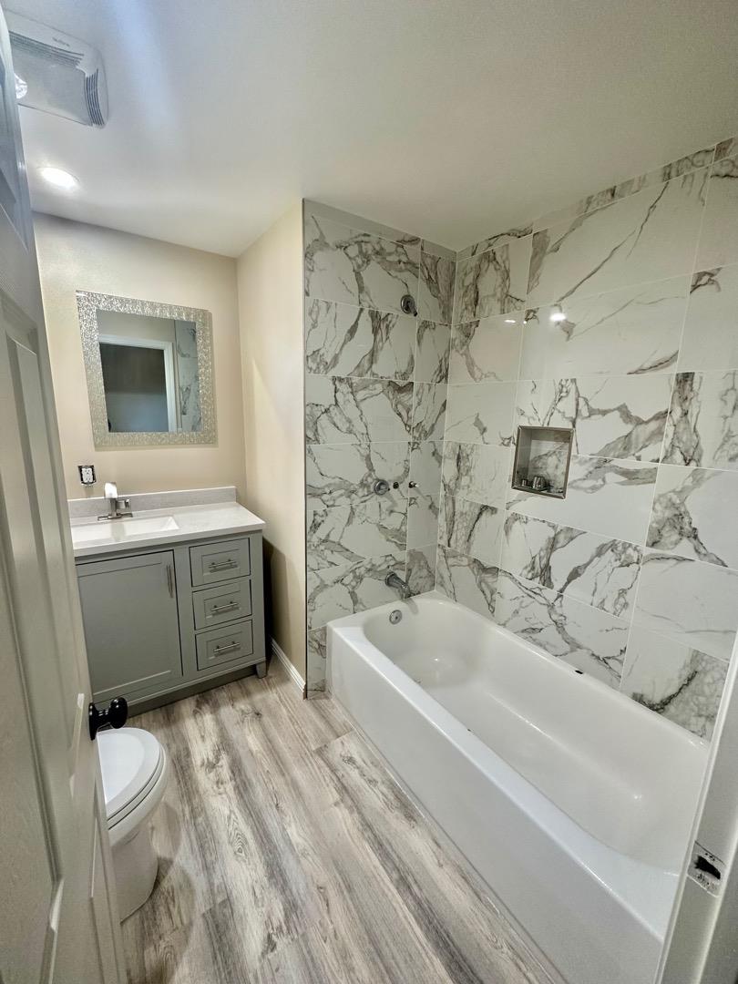 2151 Oakland Road, Unit 246 San Jose, CA 95131 - Photo 4 of 12 a bathroom with a sink a toilet and bathtub