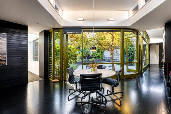 a workspace with furniture and window