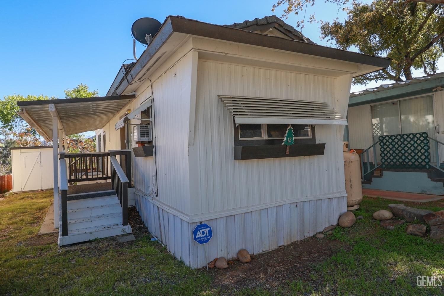 Undisclosed Address Wofford Heights, CA 93285 - Photo 3 of 26 a view of backyard with deck and outdoor seating