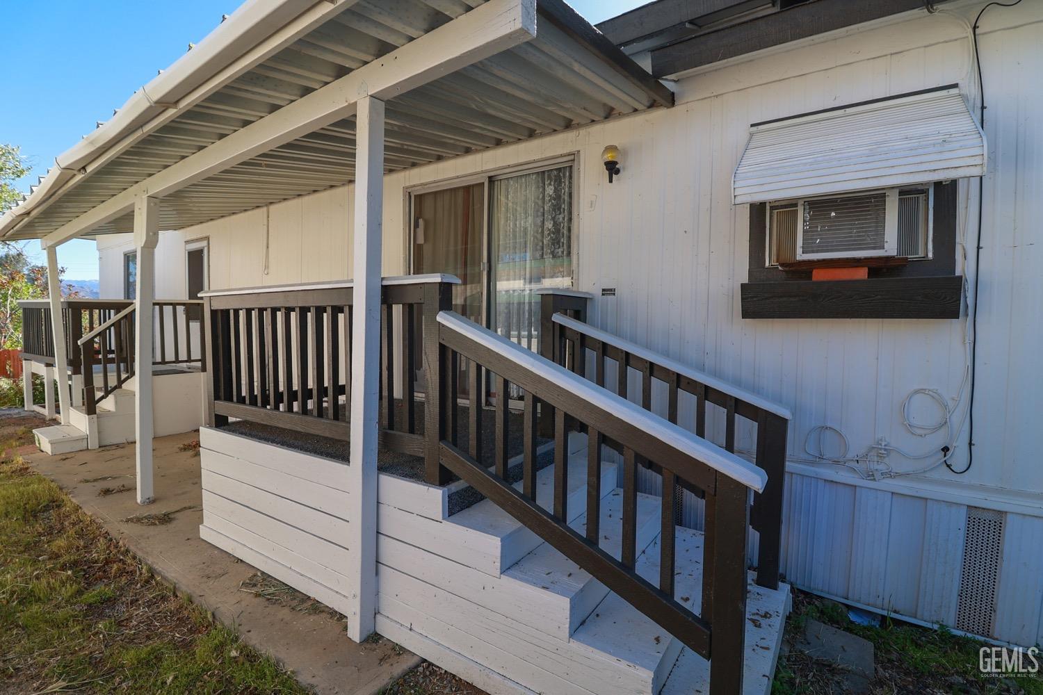 Undisclosed Address Wofford Heights, CA 93285 - Photo 6 of 26 a view of balcony with flat screen tv