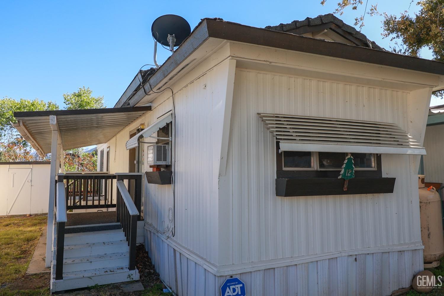 Undisclosed Address Wofford Heights, CA 93285 - Photo 7 of 26 a view of a house with deck and outdoor space
