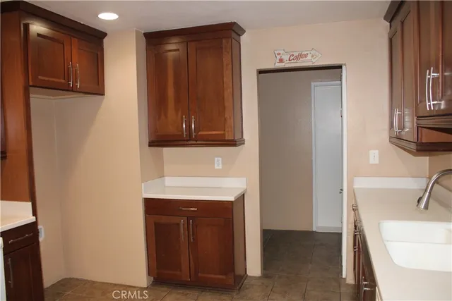 a hallway with washer and dryer