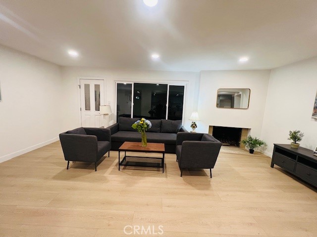 1135 Lockhaven Drive Brea, CA 92821 - Photo 12 of 35 a living room with furniture and a potted plant