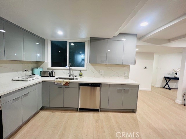 1135 Lockhaven Drive Brea, CA 92821 - Photo 18 of 35 a large kitchen with kitchen island a sink stainless steel appliances and cabinets