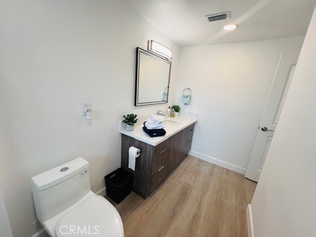1135 Lockhaven Drive Brea, CA 92821 - Photo 22 of 35 a bathroom with a sink toilet and mirror