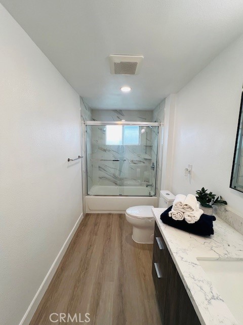 1135 Lockhaven Drive Brea, CA 92821 - Photo 25 of 35 a bathroom with a granite countertop sink a toilet and shower